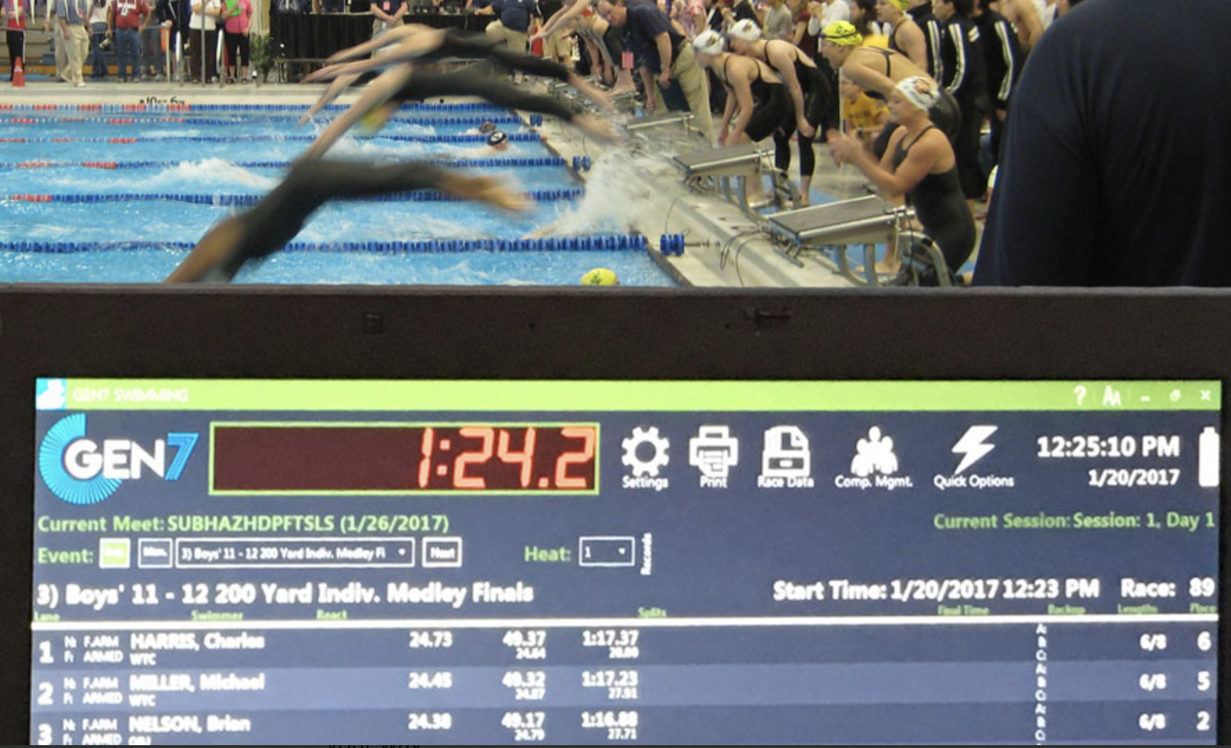 Gen7 swim timing screen on deck during a swim meet